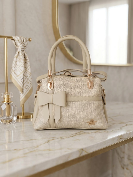 Chic Bow-Accented Cream Handbag